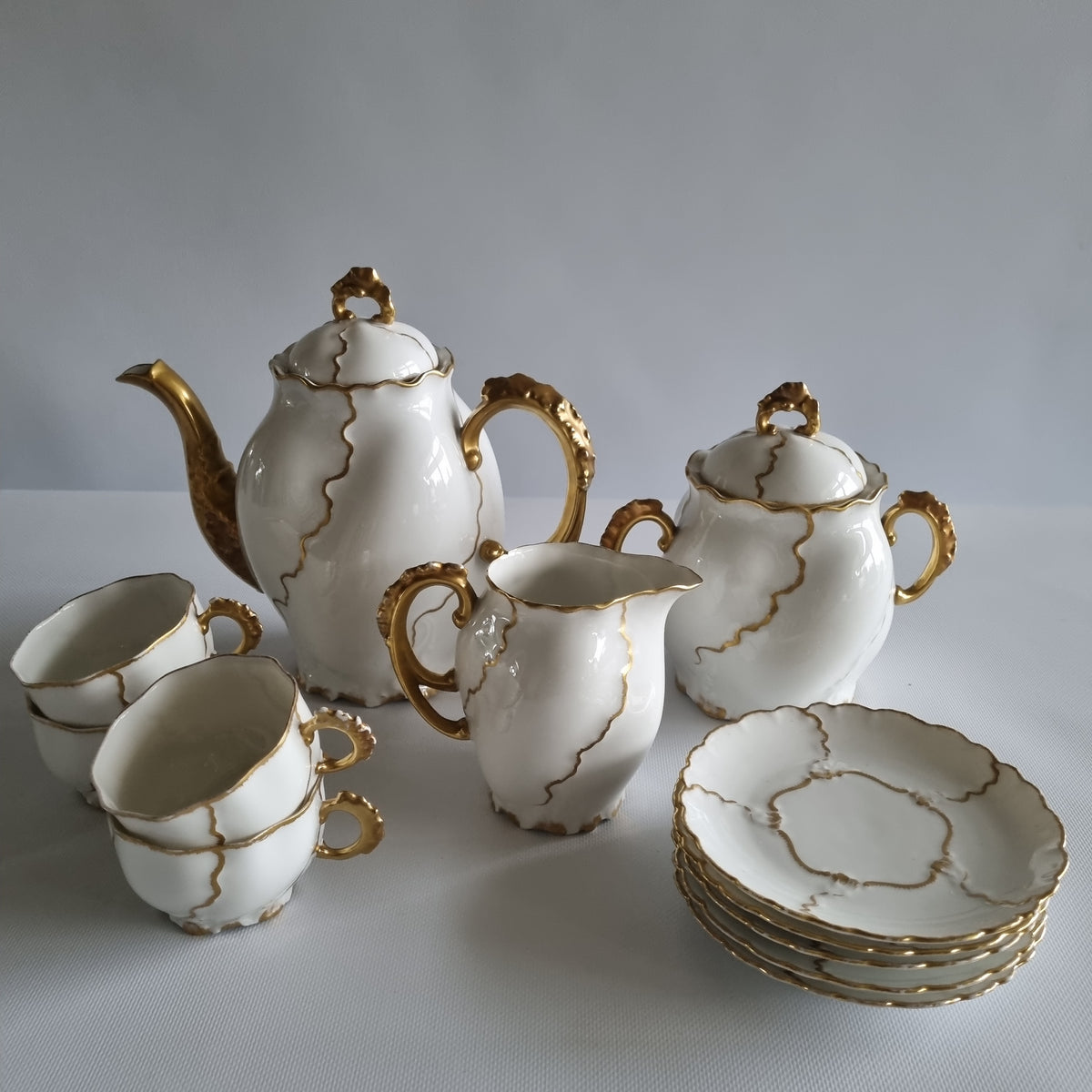 juego de cafe Limoges Prevel oro