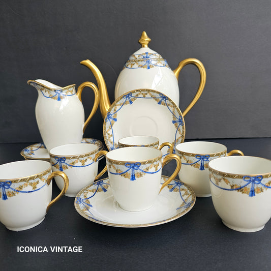 juego de cafe porcelana de limoges lazo azul y guirnalda oro
