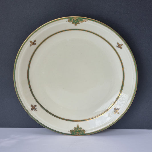 platos llanos porcelana francesa color hueso y decoracion en oro y verde hoja